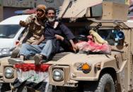 Displaced civilians rescued by Iraqi security forces at Old City are pictured as they are transported to an emergency clinic in western Mosul, Iraq June 23, 2017. REUTERS/Erik De Castro