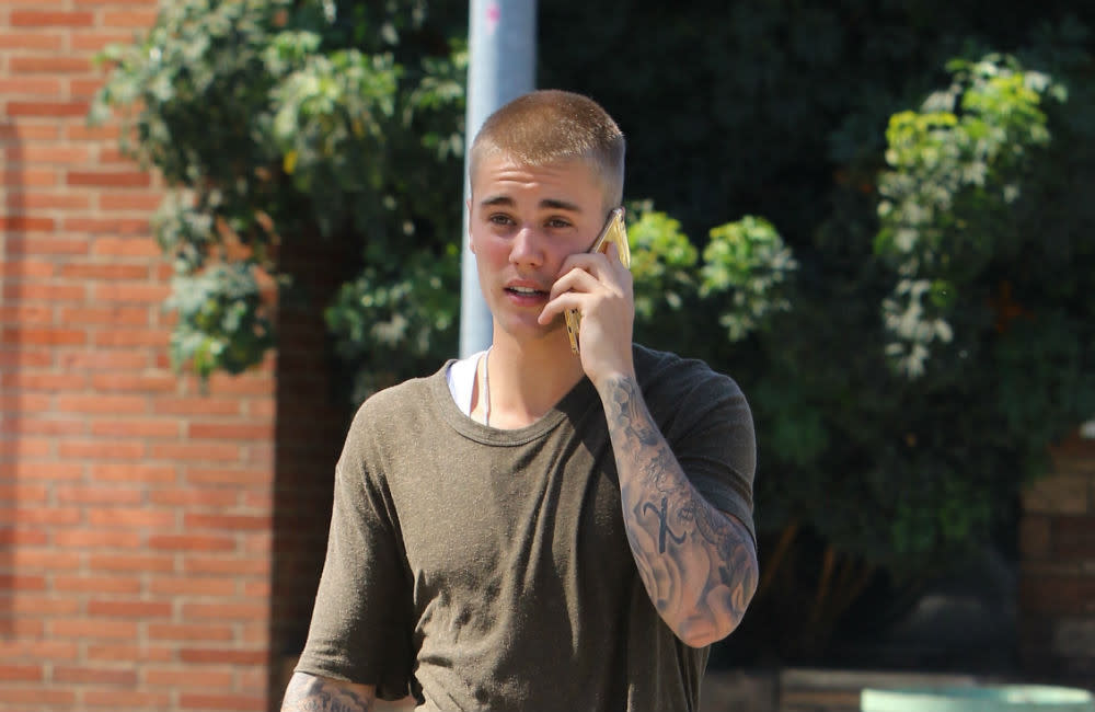 Justin Bieber - casual - shaved head - Hollywood recording studio - July 2016