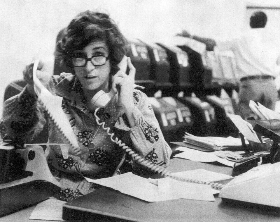FILE - In this file photo from the late 1970's Kathryn Johnson works at The Associated Press' bureau in Atlanta. Johnson, a trailblazing reporter for the AP, died Wednesday, Oct. 23, 2019, at the age of 93, in Atlanta. Her intrepid coverage of the civil rights movement and other major stories led to a string of legendary scoops. Johnson was the only journalist allowed inside Martin Luther King Jr.'s home the day he was assassinated. (AP Photo)