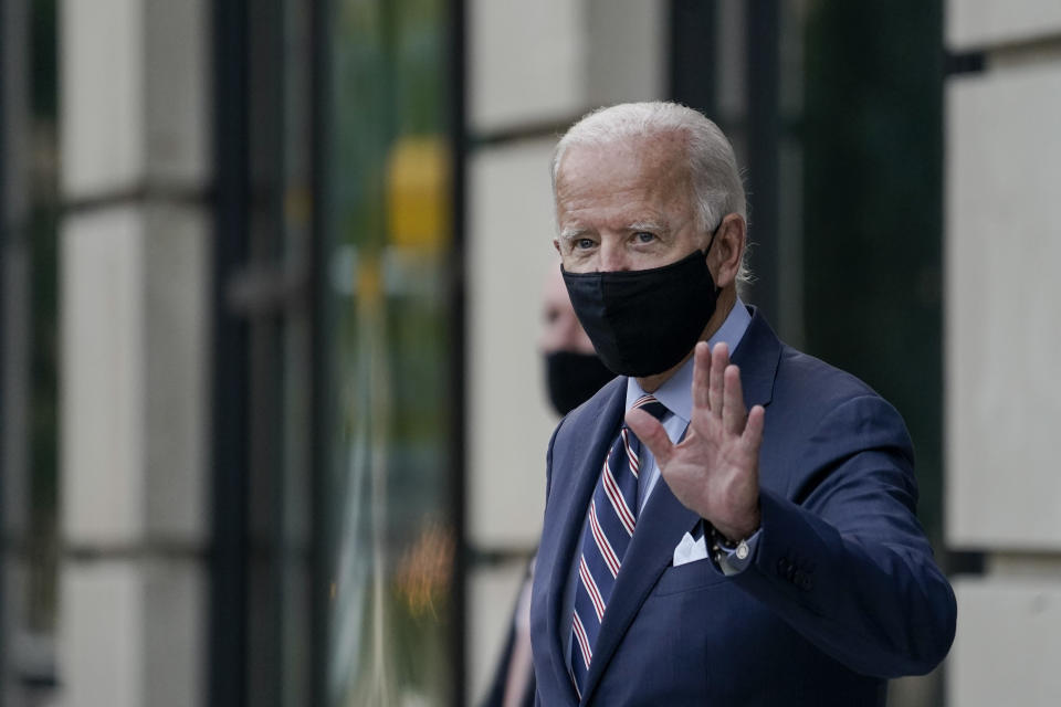 WILMINGTON, DE - SEPTEMBER 16: Democratic presidential nominee and former Vice President Joe Biden waves as he leaves the Hotel Dupont after having internal campaign meetings on September 16, 2020 in Wilmington, Delaware. Earlier in the day, Biden participated in a briefing with medical professionals about the coronavirus vaccine. (Photo by Drew Angerer/Getty Images)