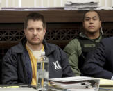 FILE - in this Dec. 14, 2018, file photo, former Chicago police Officer Jason Van Dyke, left, appears for a hearing at the Leighton Criminal Court Building, in Chicago. More than three years after the stunning video of the Chicago police shooting of McDonald was made public, one judge on Thursday, Jan. 17, 2019 is scheduled to announce how long Van Dyke who pulled the trigger 16 times will be imprisoned, and another will say if she believes three other officers lied about what happened to protect him.(Antonio Perez/Chicago Tribune via AP, Pool, File)