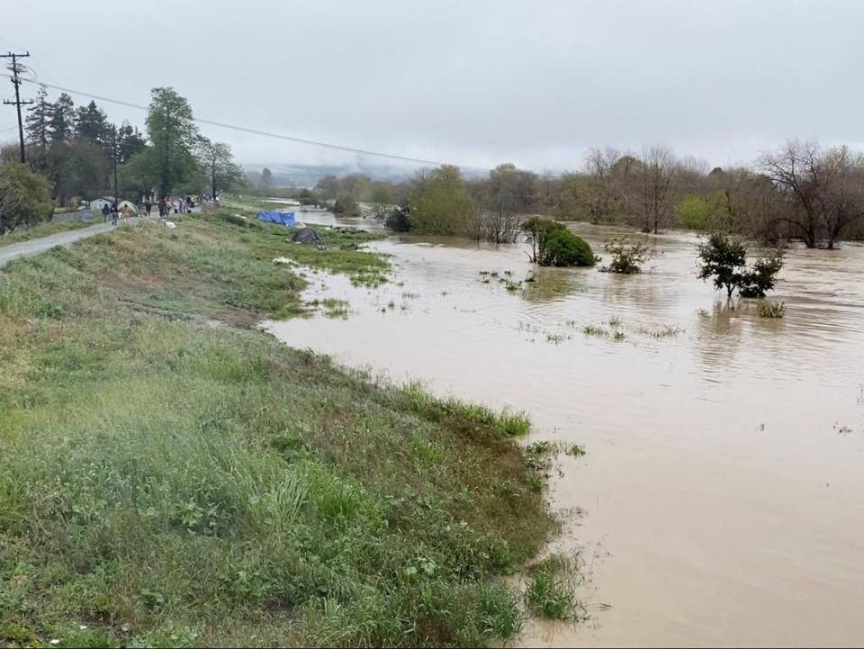 The overflowing Pajaro River in Pajaro, California (Bobbie Grennier via REUTERS)