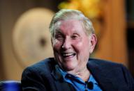 FILE PHOTO: Redstone laughs at a comment during the 2008 Milken Institute Global Conference in Beverly Hills