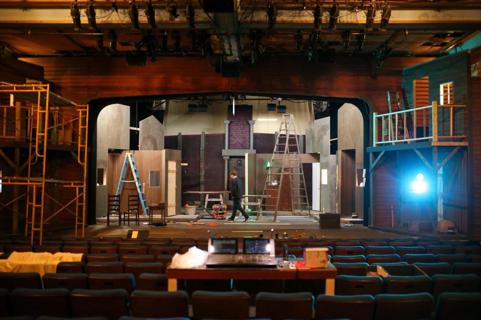 Crews work on the set for the show "A Territorial Christmas Carol" at Guthrie's Pollard Theatre on Saturday, Nov. 12, 2022.