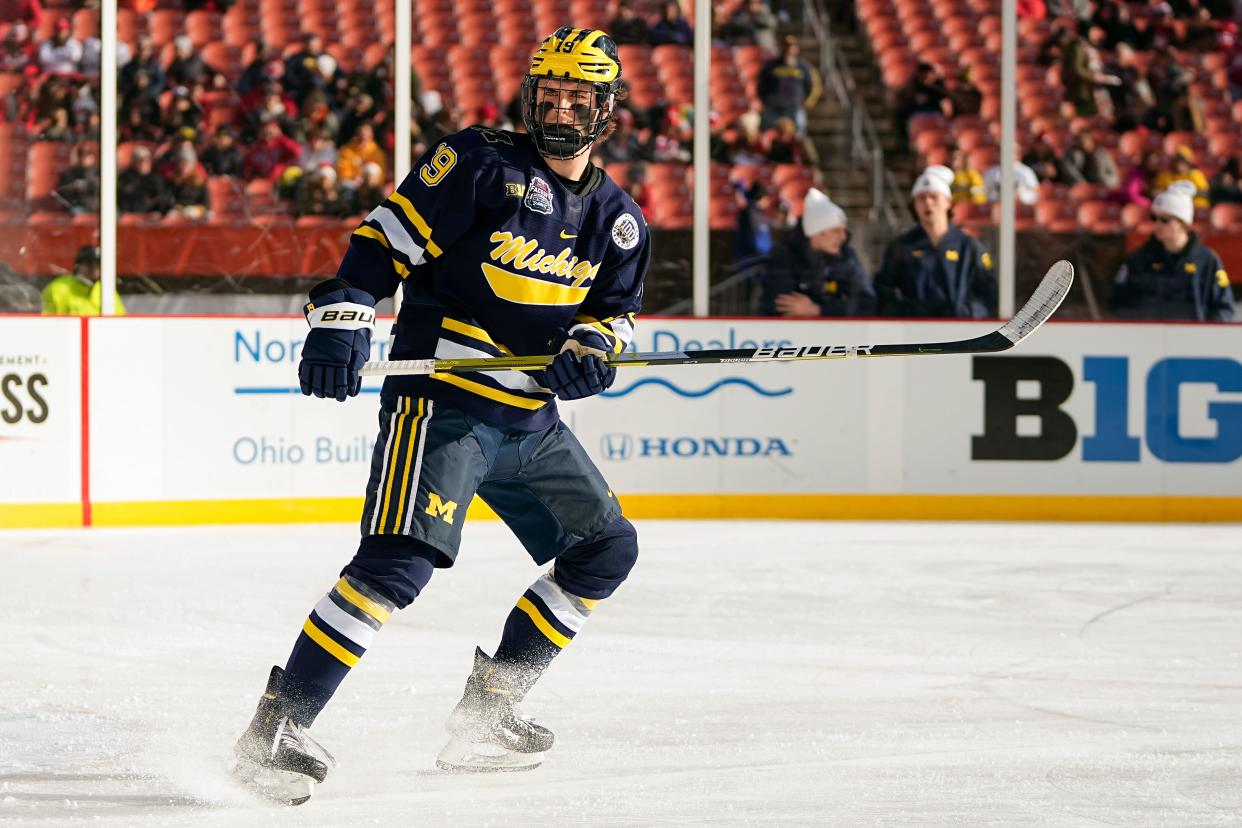 Feb 18, 2023; Cleveland, Ohio, USA;  Michigan Wolverines forward Adam Fantilli (19) skates during the Faceoff on the Lake outdoor NCAA men’s hockey game against the Ohio State Buckeyes at FirstEnergy Stadium. Mandatory Credit: Adam Cairns-The Columbus Dispatch