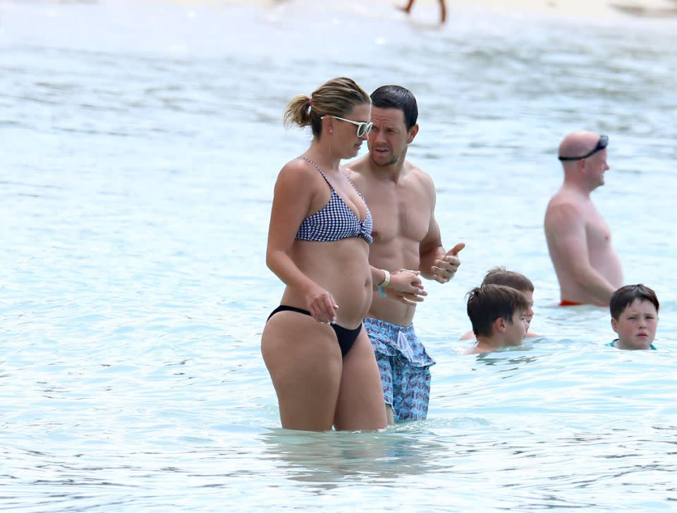 Actor Mark Walhberg and wife Rhea Durham are pictured taking a dip in the ocean while on holiday in Barbados. Source: Mega