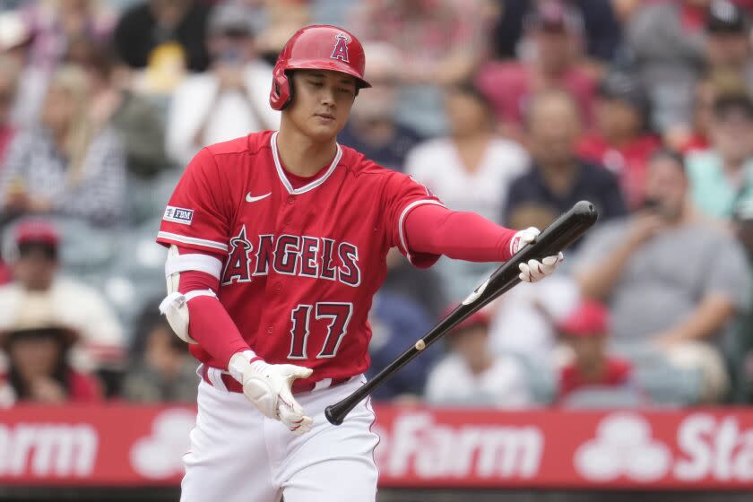 Los Angeles Angels' Shohei Ohtani drops his bat as he strikes out against the Miami Marlins.