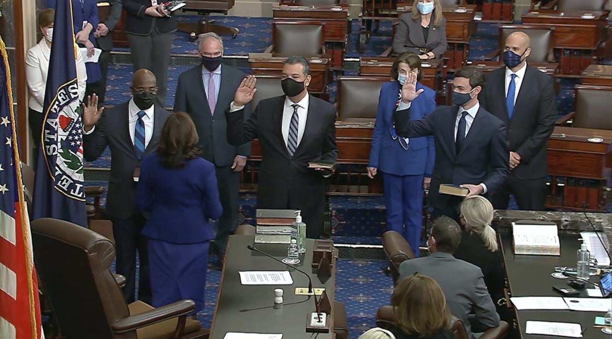 <span class="caption">Vice President Kamala Harris swears in Sen. Raphael Warnock and Sen. <span class="caas-xray-inline-tooltip"><span class="caas-xray-inline caas-xray-entity caas-xray-pill rapid-nonanchor-lt" data-entity-id="Jon_Ossoff" data-ylk="cid:Jon_Ossoff;pos:1;elmt:wiki;sec:pill-inline-entity;elm:pill-inline-text;itc:1;cat:OfficeHolder;" tabindex="0" aria-haspopup="dialog"><a href="https://search.yahoo.com/search?p=Jon%20Ossoff" data-i13n="cid:Jon_Ossoff;pos:1;elmt:wiki;sec:pill-inline-entity;elm:pill-inline-text;itc:1;cat:OfficeHolder;" tabindex="-1" data-ylk="slk:Jon Ossoff;cid:Jon_Ossoff;pos:1;elmt:wiki;sec:pill-inline-entity;elm:pill-inline-text;itc:1;cat:OfficeHolder;" class="link ">Jon Ossoff</a></span></span> on Capitol Hill in Washington. </span> <span class="attribution"><a class="link " href="https://newsroom.ap.org/detail/HarrisSenate/bb5f4903643b472a9d1575605f37536f/photo?Query=Sen.%20Jon%20Ossoff,%20D-Ga.,%20on%20the%20floor%20of%20the%20Senate%20Wednesday,%20Jan.%206,%202021,%20on%20Capitol%20Hill%20in%20Washington.%20Senate%20Television%20via%20AP&mediaType=photo&sortBy=&dateRange=Anytime&totalCount=2&currentItemNo=0" rel="nofollow noopener" target="_blank" data-ylk="slk:Senate Television via AP;elm:context_link;itc:0;sec:content-canvas">Senate Television via AP</a></span>