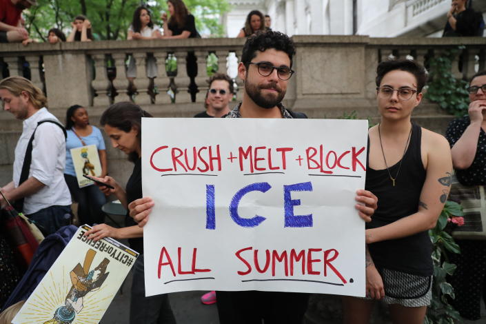 <p>A protester holds sign slamming I.C.E. on the terrace outside the New York Public Library on 42nd Street in New York City on June 20, 2018. (Photo: Gordon Donovan/Yahoo News) </p>