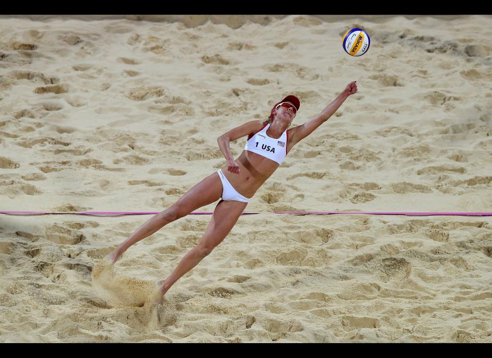 April Ross of the United States lunges for the ball in the Women's Beach Volleyball Gold medal match against the United States on Day 12 of the London 2012 Olympic Games at the Horse Guard's Parade on August 8, 2012 in London, England.