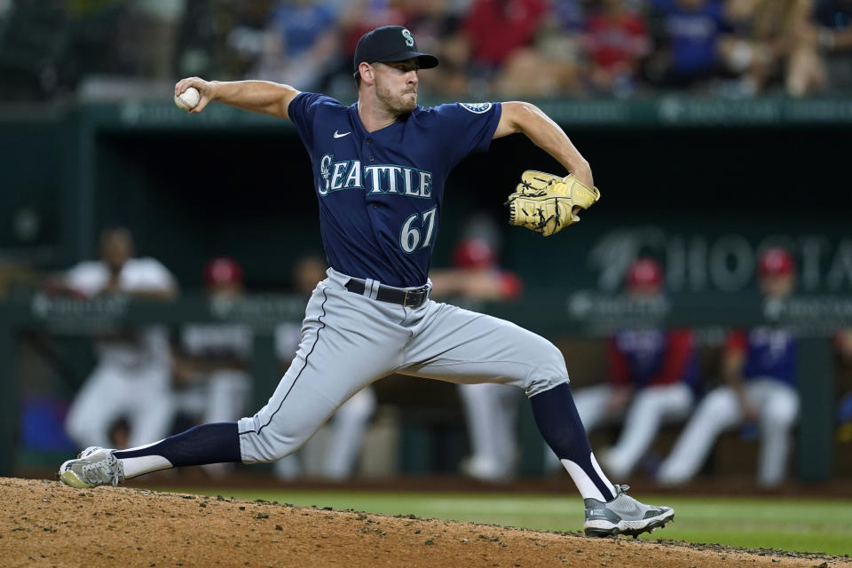 Seattle Mariners relief pitcher Matthew Festa throws to a Texas Rangers batter during the seventh inning of a baseball game Thursday, July 14, 2022, in Arlington, Texas. (AP Photo/Tony Gutierrez)