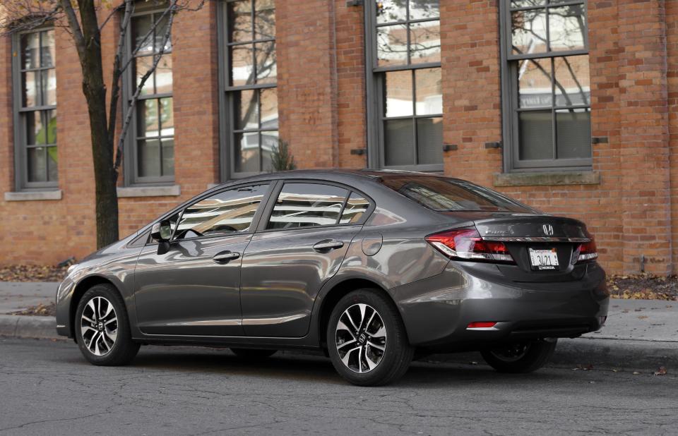 A 2013 Honda Civic is shown in Detroit, Tuesday, Nov. 27, 2012. Just 19 months after its Civic compact car hit showrooms and got slammed by critics, the company has revamped the vehicle, giving it a new look and upgrading the interior. (AP Photo/Paul Sancya)