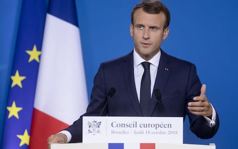 French President Emmanuel Macron is talking to media at the end of an EU chief of state summit in the Europa, the EU Council headquarter  - Credit:  Thierry Monasse/Getty 