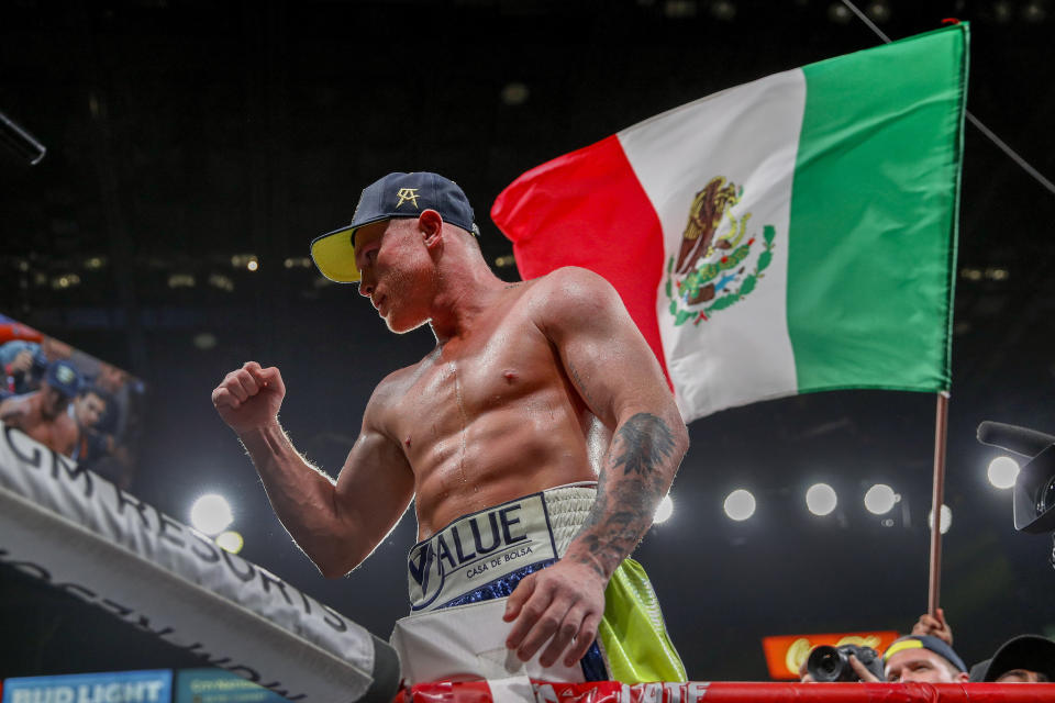 Canelo Alvarez celebrates after defeating Sergey Kovalev by knockout in a light heavyweight WBO title bout, Saturday, Nov. 2, 2019, in Las Vegas (AP Photo/John Locher)