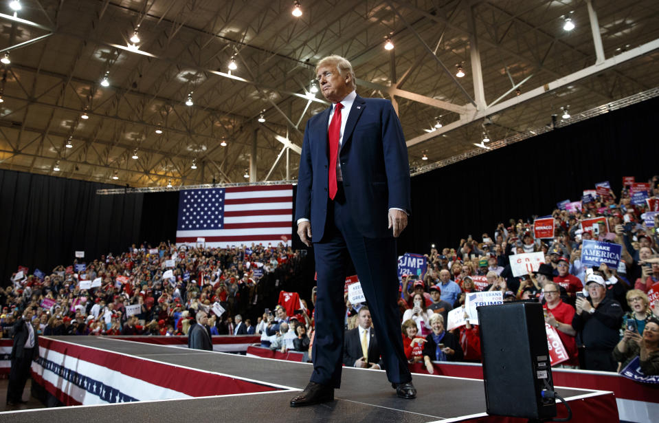 President Donald Trump arrives to speak at a rally at the IX Center, in Cleveland, Monday, Nov. 5, 2018, (AP Photo/Carolyn Kaster)