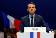 Emmanuel Macron, head of the political movement En Marche !, or Forward !, and candidate for the 2017 French presidential election, attends a political rally in Toulon, France February 18, 2017. REUTERS/Jean-Paul Pelissier