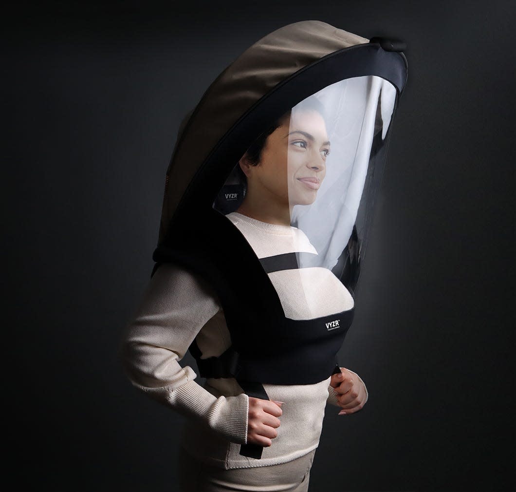 A woman wearing a BioVYZR. Copyright VYZR Technologies