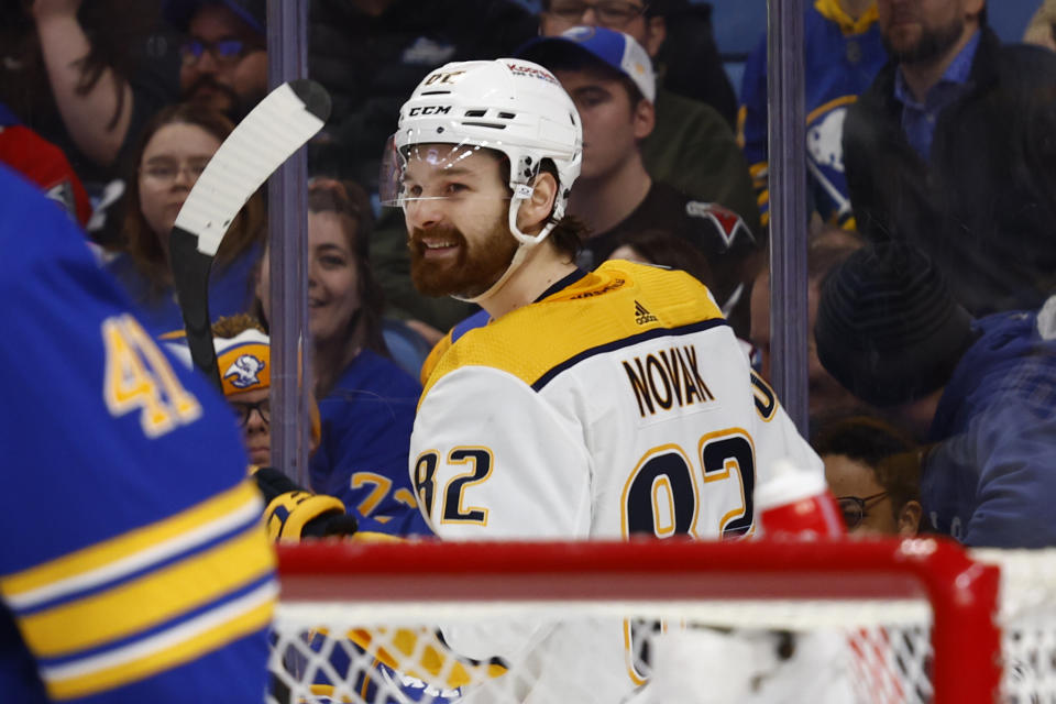 Nashville Predators center Tommy Novak (82) celebrates his goal during the second period of an NHL hockey game against the Buffalo Sabres, Tuesday, March 21, 2023, in Buffalo, N.Y. (AP Photo/Jeffrey T. Barnes)