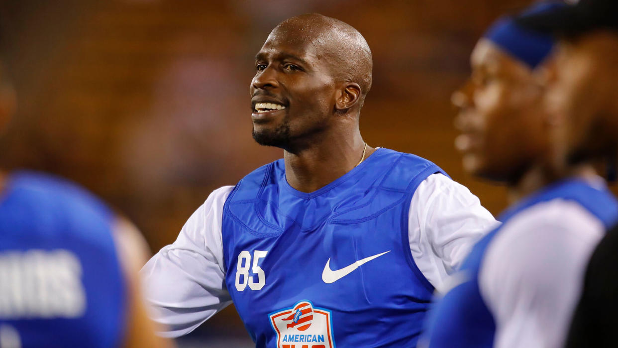 Mandatory Credit: Photo by Todd Kirkland/AP/REX/Shutterstock (9745025o)Ocho's Chad Ochocinco smiles during a semifinal game against Ocho during the American Flag Football League (AFFL) U.