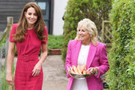 <p>Kate Middleton and First Lady Jill Biden color coordinate on June 11 while heading to feed some rabbits during their visit to Connor Downs Academy in Hayle, England. </p>