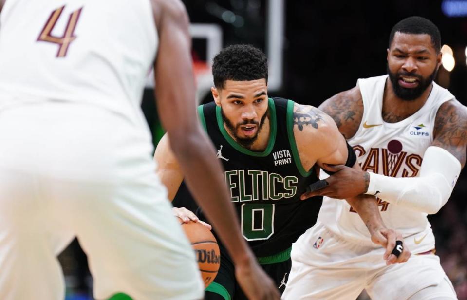 Boston Celtics forward Jayson Tatum (0) drivers the ball against Cleveland Cavaliers forward Marcus Morris Sr. (24) in the third quarter during Game 5 of the second round for the 2024 NBA playoffs at TD Garden on May 15, 2024.