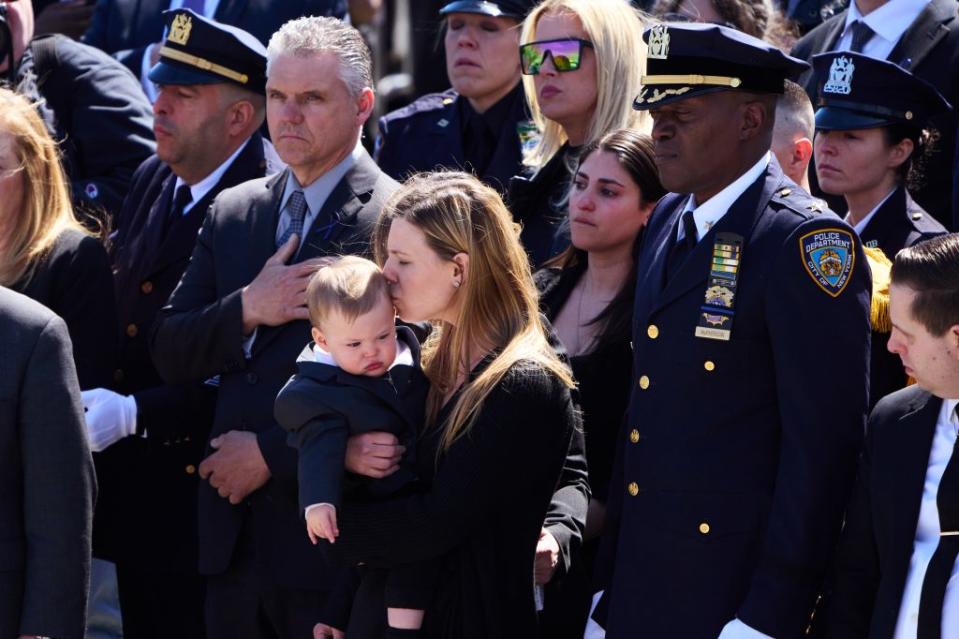 Diller’s widow Stephanie holding the couple’s 1-year-old son. James Keivom