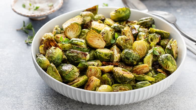 Bowl full of crispy, roasted brussels sprouts