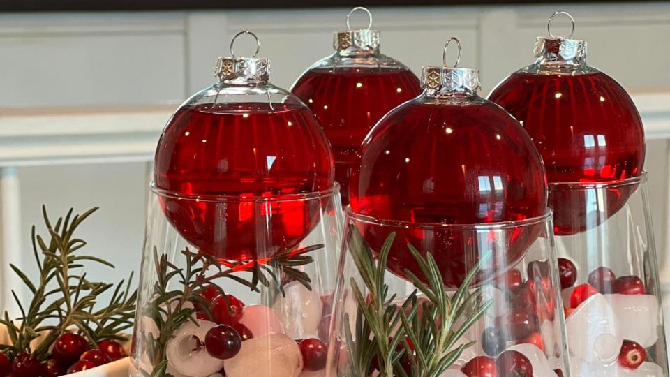 PHOTO: A festive holiday mocktail with cranberry juice filled ornaments.  (Mama Now What)