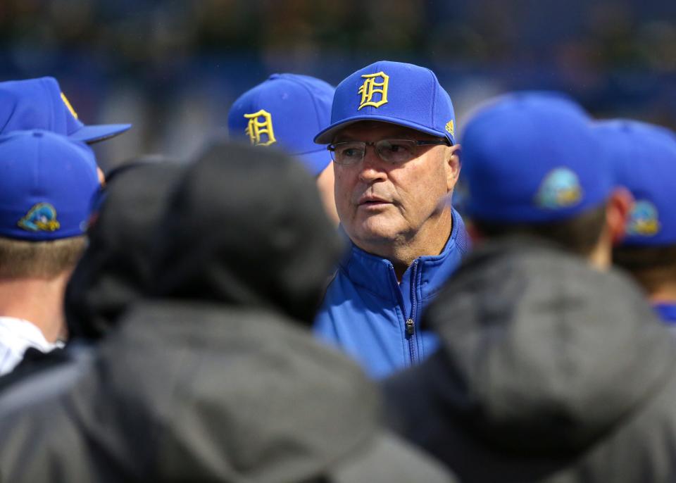 Jim Sherman talks to his team after a 2019 game against William & Mary.