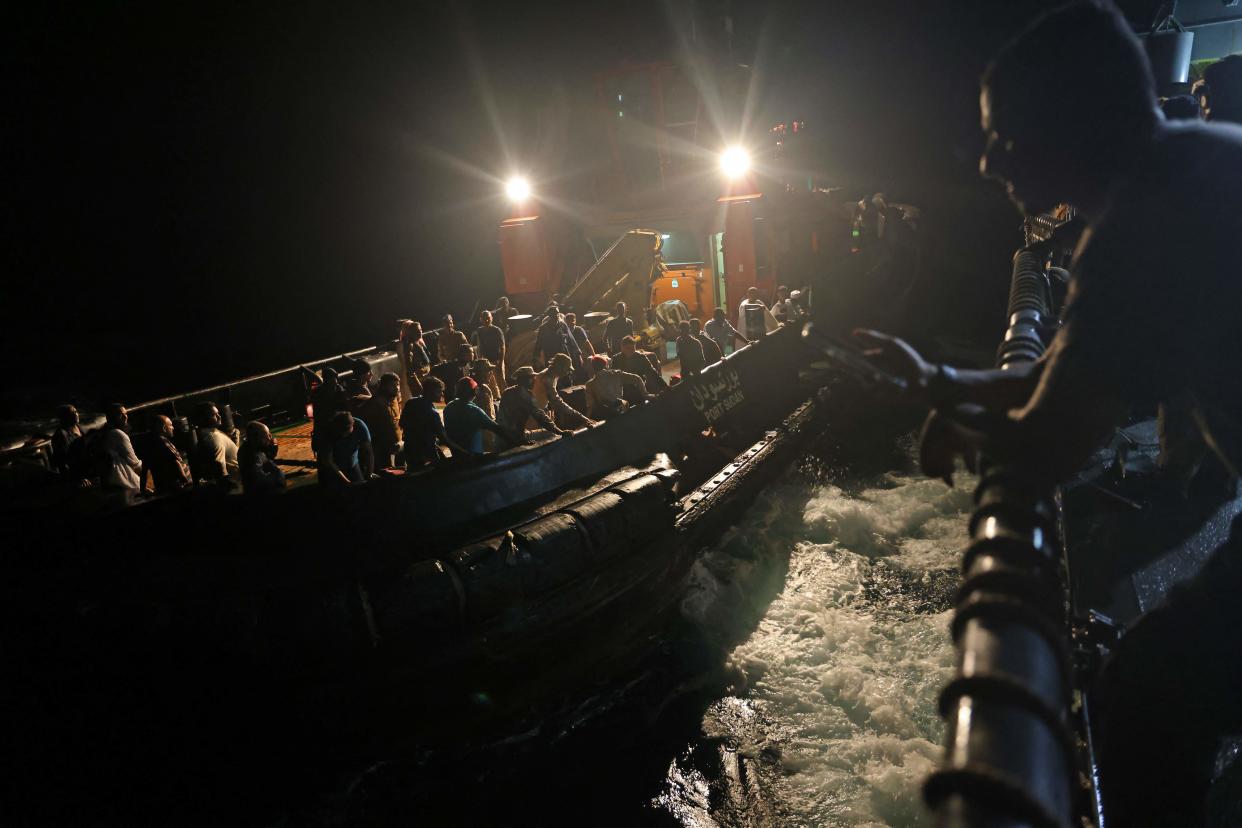Evacuees are transported aboard a tugboat before boarding a Saudi vessel on April 30, 2023 during a rescue operation from Port Sudan to Jeddah (AFP via Getty Images)