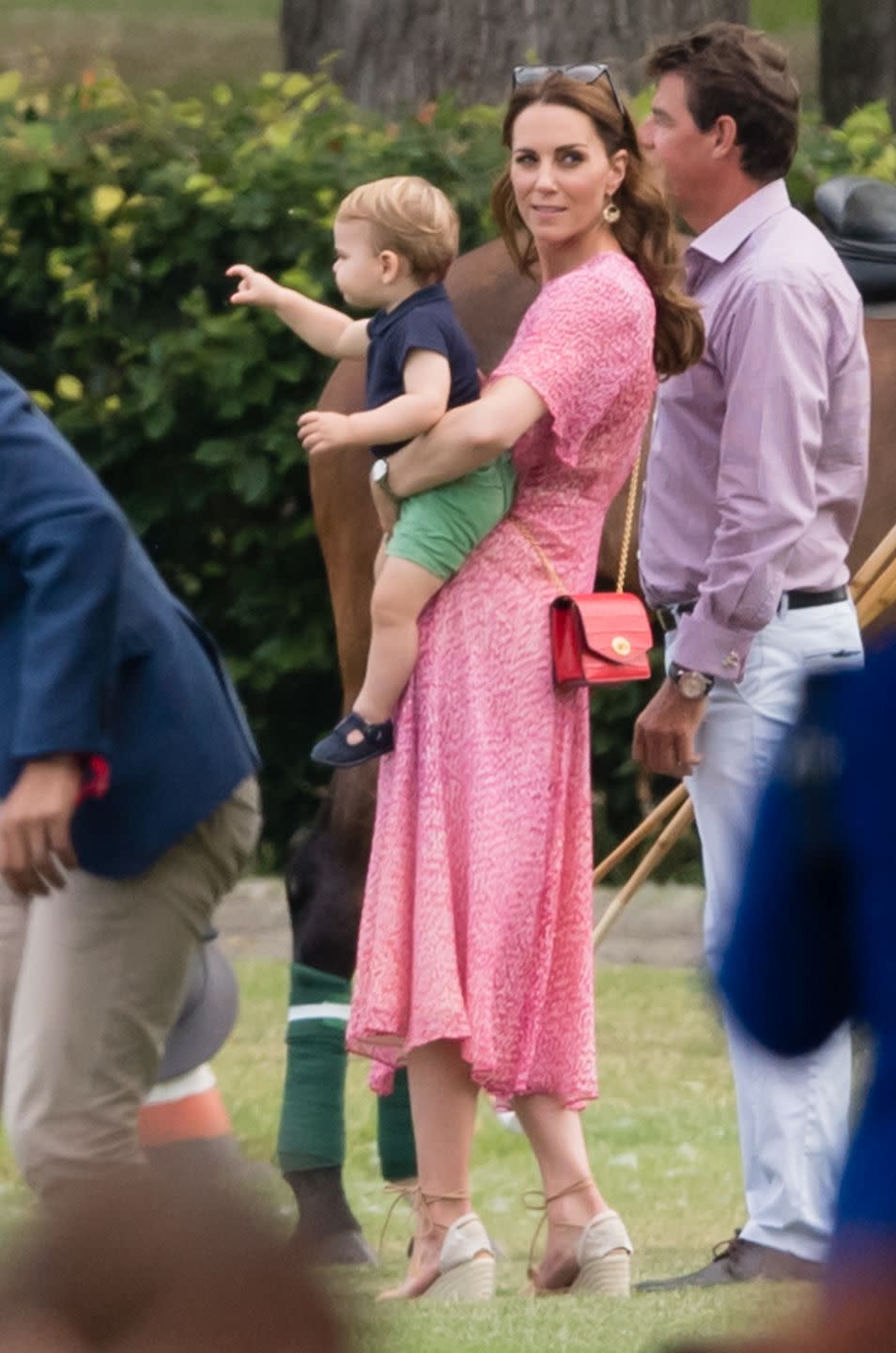 <p>Kate Middleton brought the kids to watch Prince William play in a polo match for charity—and spent quite a bit of time chasing around Prince Louis.</p>