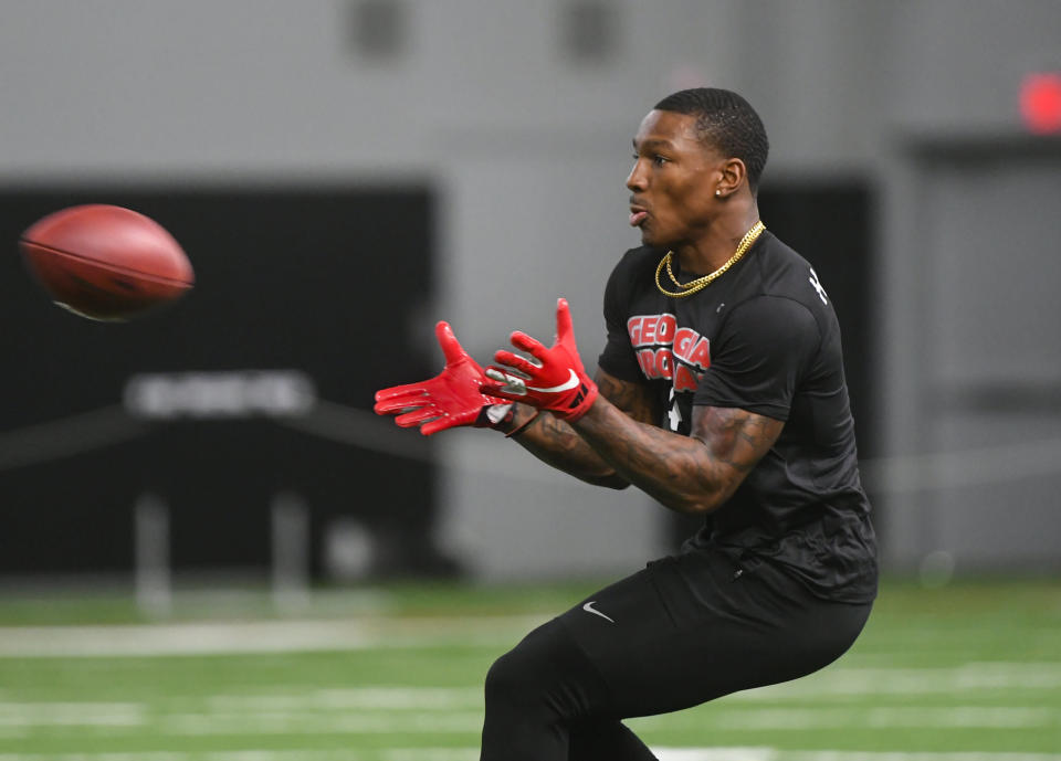 Georgia wide receiver Mecole Hardman prepares to catch a football during Georgia Pro Day, Wednesday, March 20, 2019, in Athens, Ga. (AP Photo/John Amis)