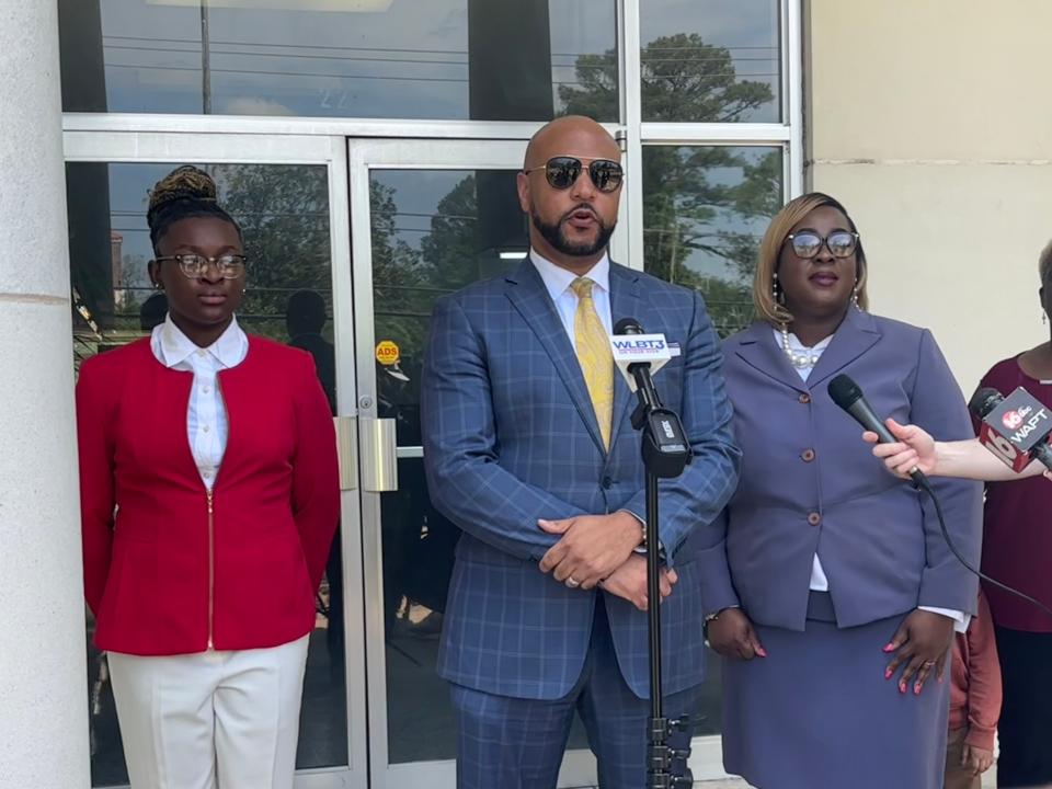 Catanna Francois, Carlos Moore and Alexis Davis during a press conference at Canton City Hall Monday afternoon. Francois, an eighth-grade student at Nichols Middle School, alleged the school's resource officer physically and verbally assaulted her on April 4.