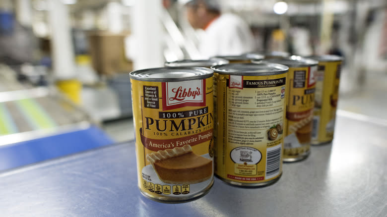 Canned pumpkin products on assembly line