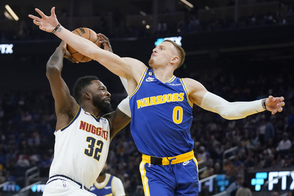 Denver Nuggets forward Jeff Green (32) shoots against Golden State Warriors guard Donte DiVincenzo (0) during the first half of an NBA basketball game in San Francisco, Friday, Oct. 21, 2022. (AP Photo/Jeff Chiu)
