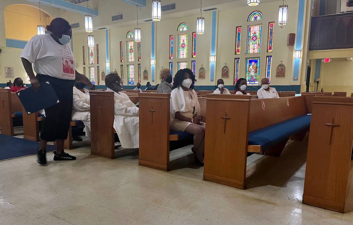 Members of the St. Theresa Chapter of the Episcopal Churchwomen sit in the pews of the Historic Saint Agnes Episcopal Church in the Overtown neighborhood of Miami, Florida on Sunday, September 25, 2022. Comprised of Black women with the goal of bettering their community, the group celebrated 50 years of service on Sunday.