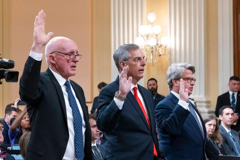 Arizona House Speaker Rusty Bowers (from left), Georgia Secretary of State Brad Raffensperger and Georgia Deputy Secretary of State Gabriel Sterling are sworn in before testifying as the House select committee investigating the Jan. 6 attack on the U.S. Capitol continues to reveal its findings of a year-long investigation at the Capitol in Washington on June 21, 2022.