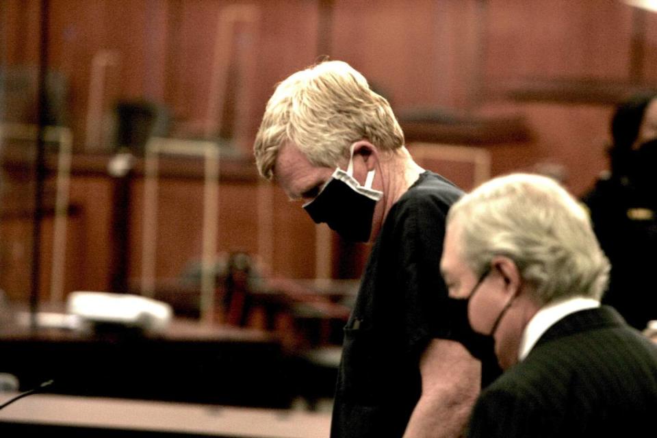 FILE - Alex Murdaugh awaits the beginning of his bond hearing in the Richland Judicial Center in Columbia, S.C., Tuesday, Oct. 19, 2021. Murdaugh was indicted Friday, Nov. 19, on 27 additional charges involving financial crimes. Prosecutors say Murdaugh stole nearly $5 million in settlement money he had obtained for his dead housekeeper, an injured state trooper and other people as well as fees meant for his law firm. (AP Photo/Lewis M. Levine, Pool)