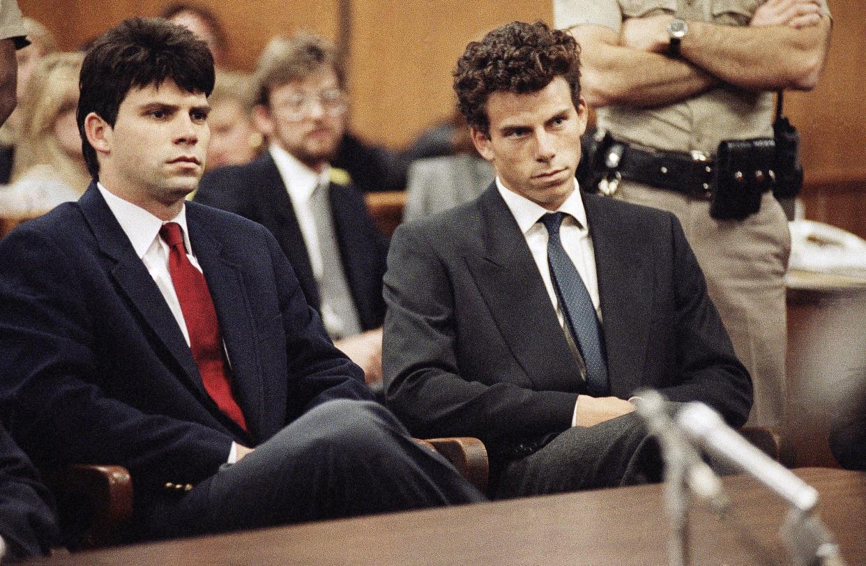 Lyle, left, and Erik Menendez sit in Beverly Hills Municipal Court where their attorneys delayed making pleas on behalf of the brothers who are suspected in the murders of their millionaire parents, Jose and Mary Louise “Kitty” Menendez, in Beverly Hills, Calif., last Aug., March 12, 1990. The arraignment for the brothers has been scheduled for March 26. (AP Photo/Nick Ut)