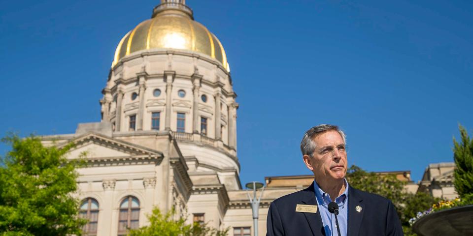 Georgia Secretary of State Brad Raffensperger speaks during a presser at Liberty Plaza, across the street from the Georgia State Capitol building, in downtown Atlanta, Monday, April 6, 2020. Raffensperger announced the creation of an "absentee ballot task force" that will investigate reports of fraud as Georgia expands mail-in voting for the May 19 primary election. (Alyssa Pointer/Atlanta Journal-Constitution via AP)