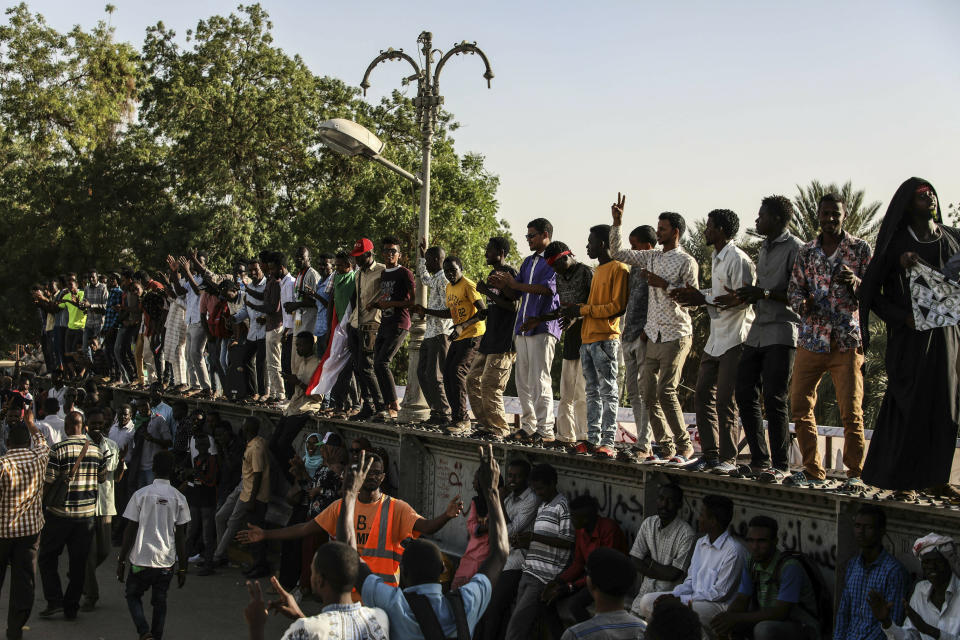 In this Tuesday, April 23, 2019, photo, Sudanese protesters rally in the capital Khartoum. Sudanese activists were holding nationwide protests on Tuesday to press the military to hand over power to a civilian authority after the overthrow of President Omar al-Bashir earlier this month.(AP Photo)