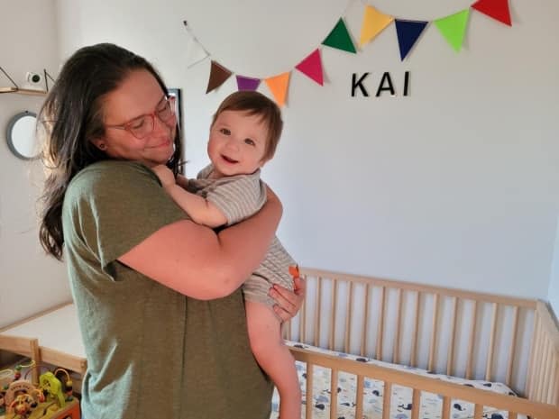 Jasmine Evanson holds her 10-month-old son, Kai. the of Maple Ridge mother says the isolation of early lockdown caused severe anxiety from the first trimester of her pregnancy onward. (Submitted by Jasmine Evanson - image credit)