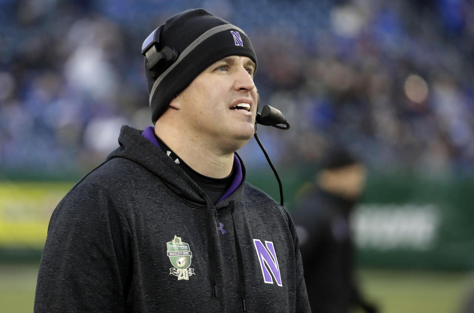 Northwestern head coach Pat Fitzgerald watches from the sideline in the first half of the Music City Bowl NCAA college football game against Kentucky, Friday, Dec. 29, 2017, in Nashville, Tenn. (AP Photo/Mark Humphrey)