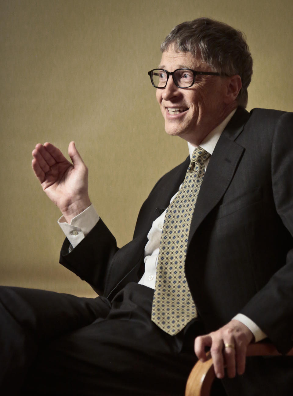 Philanthropist Bill Gates speaks during an interview on Tuesday, Jan. 21, 2014, in New York. Gates pitched an optimistic future for the world's poor and sick his annual letter, arguing passionately against three myths he said hurt efforts to bring people out of poverty, save lives and improve living conditions. (AP Photo/Bebeto Matthews)