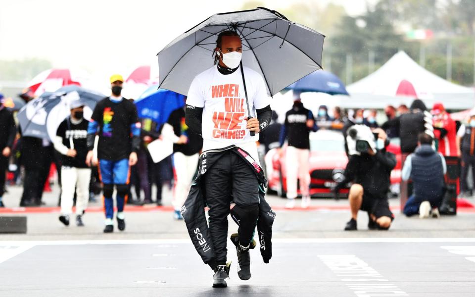 Lewis Hamilton of Great Britain and Mercedes GP stands on the grid ahead of the F1 Grand Prix of Emilia Romagna at Autodromo Enzo e Dino Ferrari on April 18, 2021 in Imola, Italy. - Dan Istitene - Formula 1 