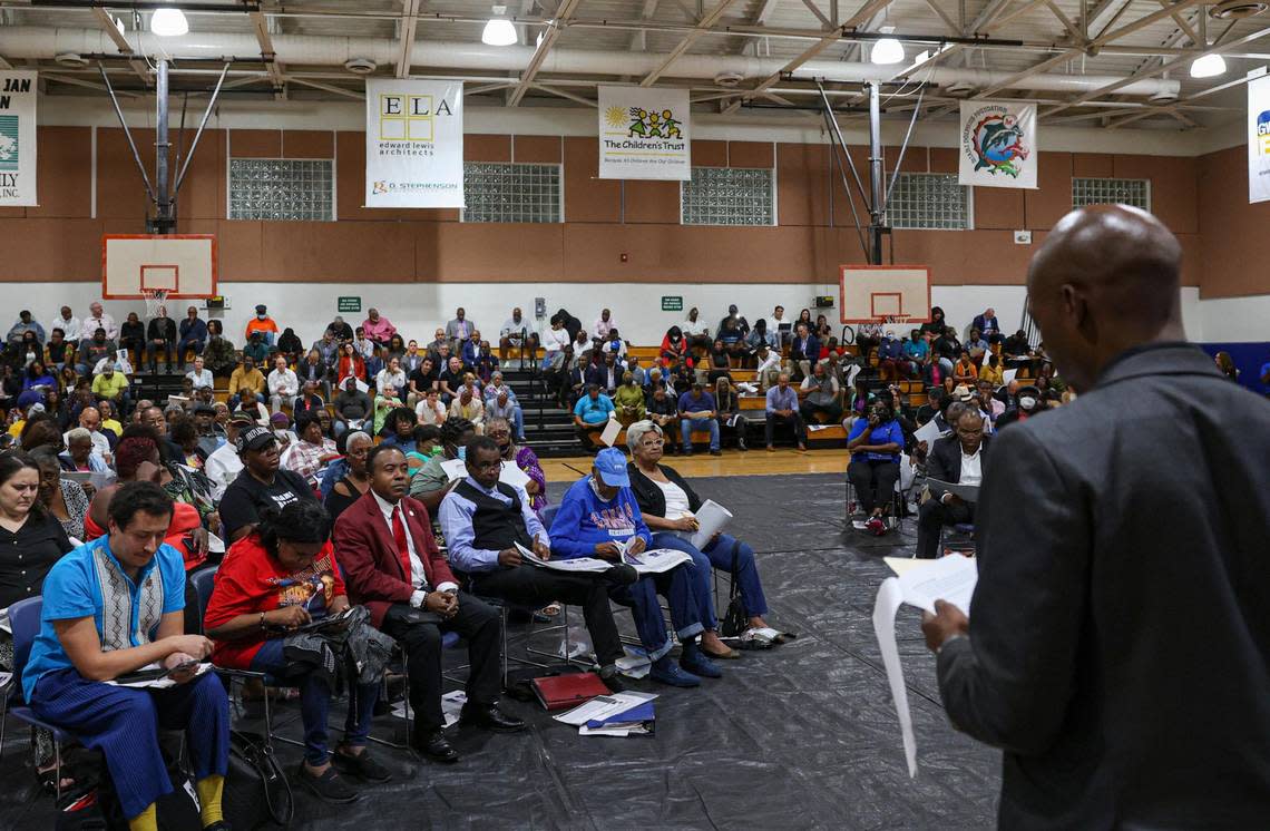 Community members listen to a presentation during the town hall discussing plans for the Poinciana Industrial Park on Monday, Feb. 6, 2023.