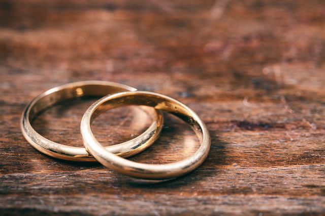<p>Getty</p> A pair of golden wedding rings