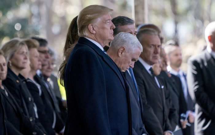 President Donald Trump and Vice President Mike Pence arrive at the funeral of Reverend Billy Graham in Charlotte, North Carolina. Andrew Harnik / AP