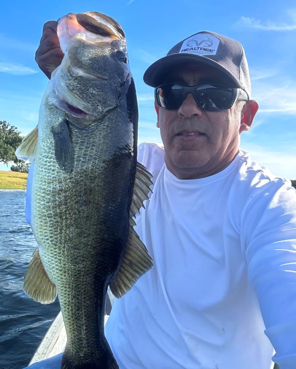 Capt. Ray Cardona used a spinner bait to get the attention of this bass, which checked in at over 8 pounds.