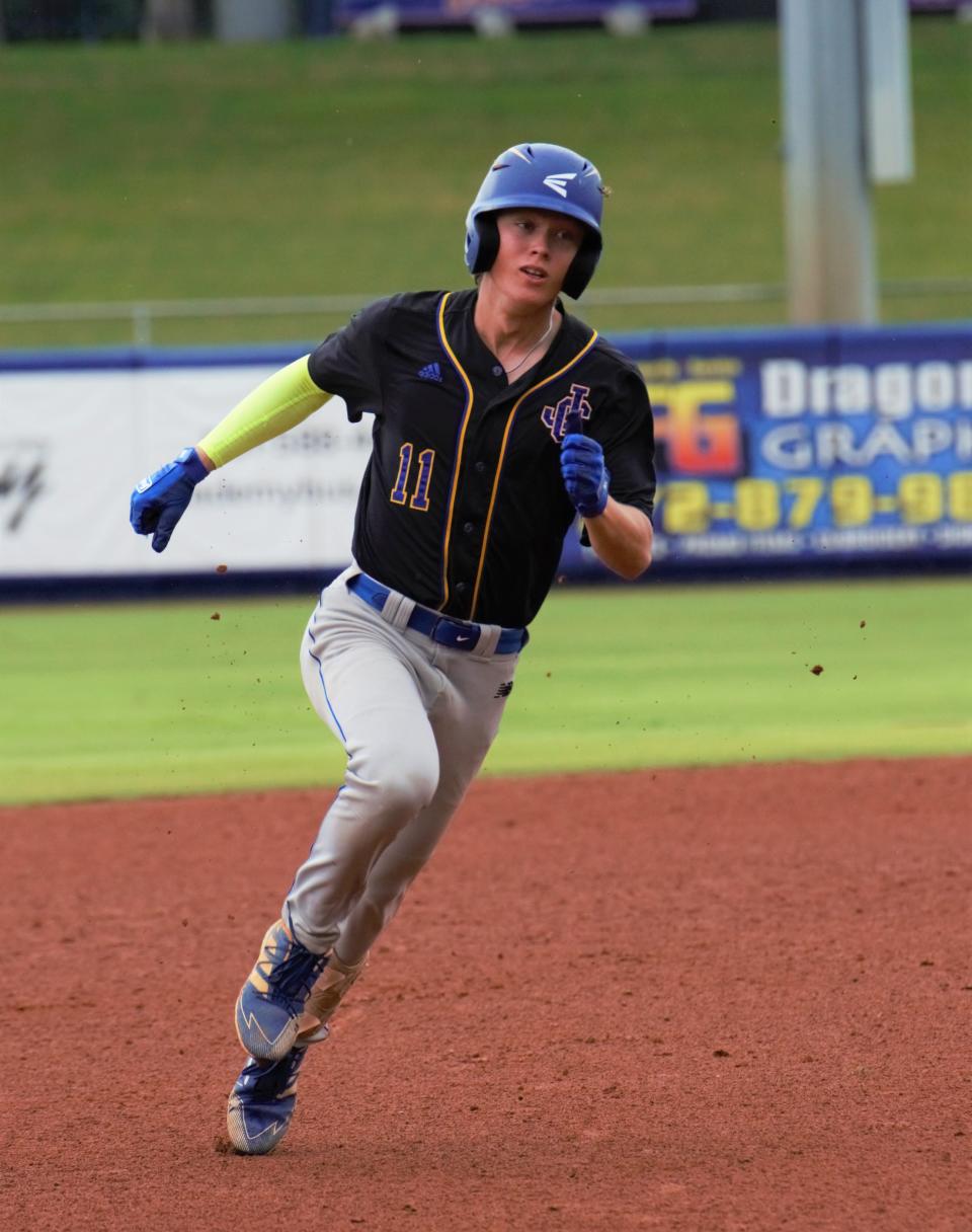 John Carroll Catholic's Grant Gilooly races into third base with a triple during the Mike Picano Senior All-Star Game at Clover Park in Port St. Lucie on Wednesday, May 1, 2022. Gilooly will continue his baseball career next spring at Bethune-Cookman.